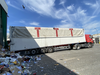 Net and tarpaulin for moving floor trailers and semi-trailers